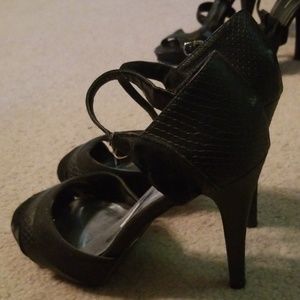 Peep toed black heels